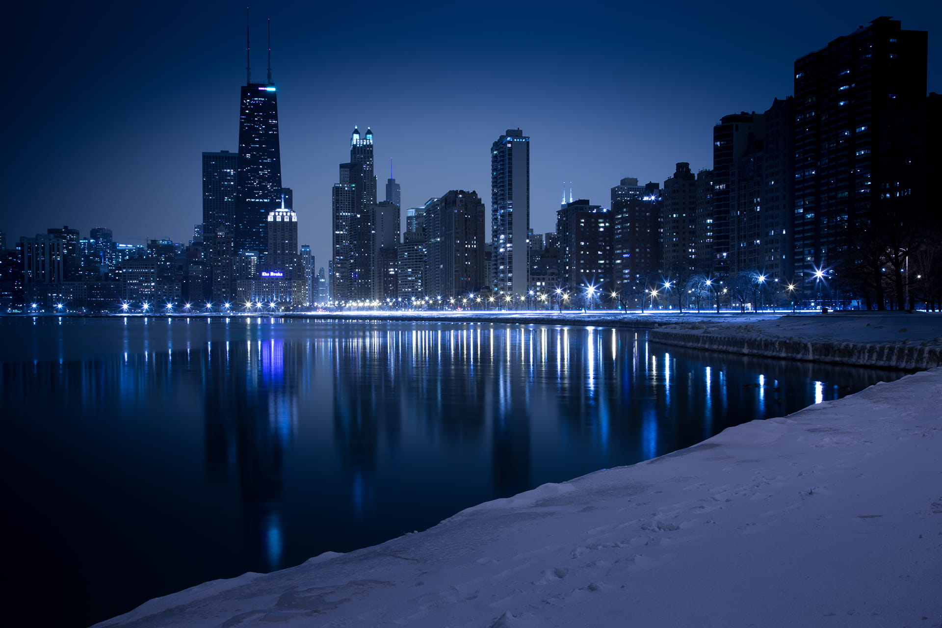 Blue and Black Chicago Skyline at Night